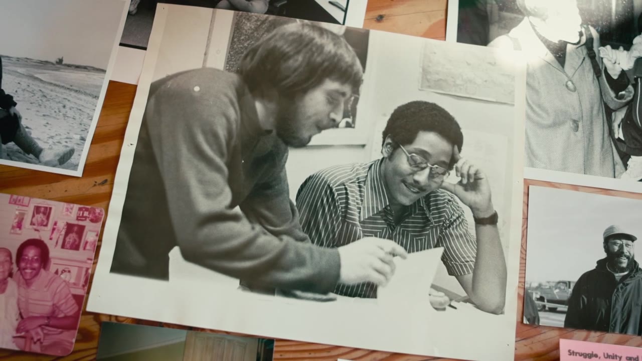 Archival photographs of Luis DeGraffe laid out on a table