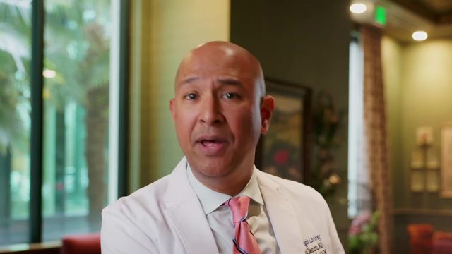Dr. Raj speaking to camera